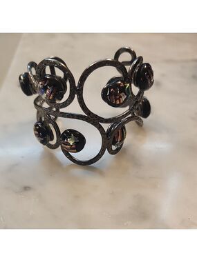 Intricate Black Scrollwork Bracelet with Amber Accents
